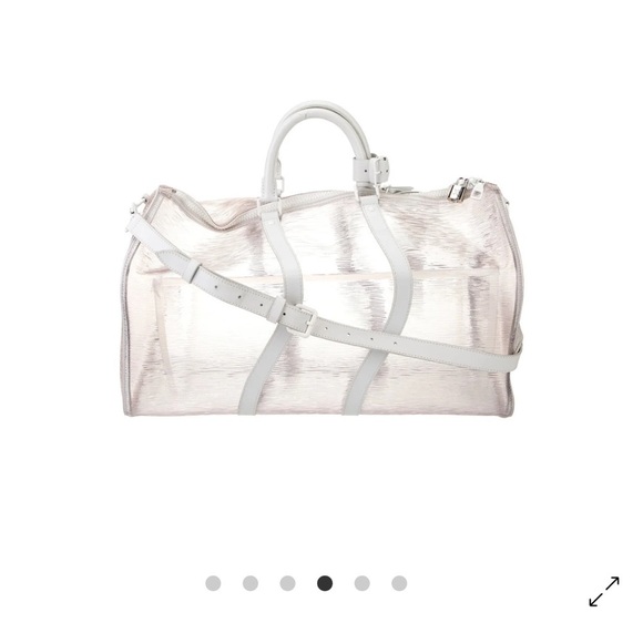 Louis Vuitton
PVC Epi Plage Wavy Keepall Bandouliére Shoulder Bag - Picture 4 of 13